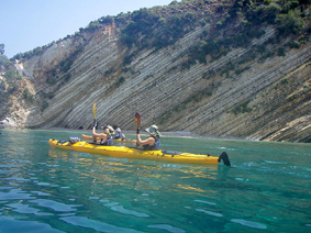 paddling next to limestone layers, Gidaki